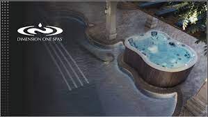Bird's eye view of the best 2024 hydrotherapy hot tubs arranged in a serene outdoor setting, showcasing various sizes and jet styles.