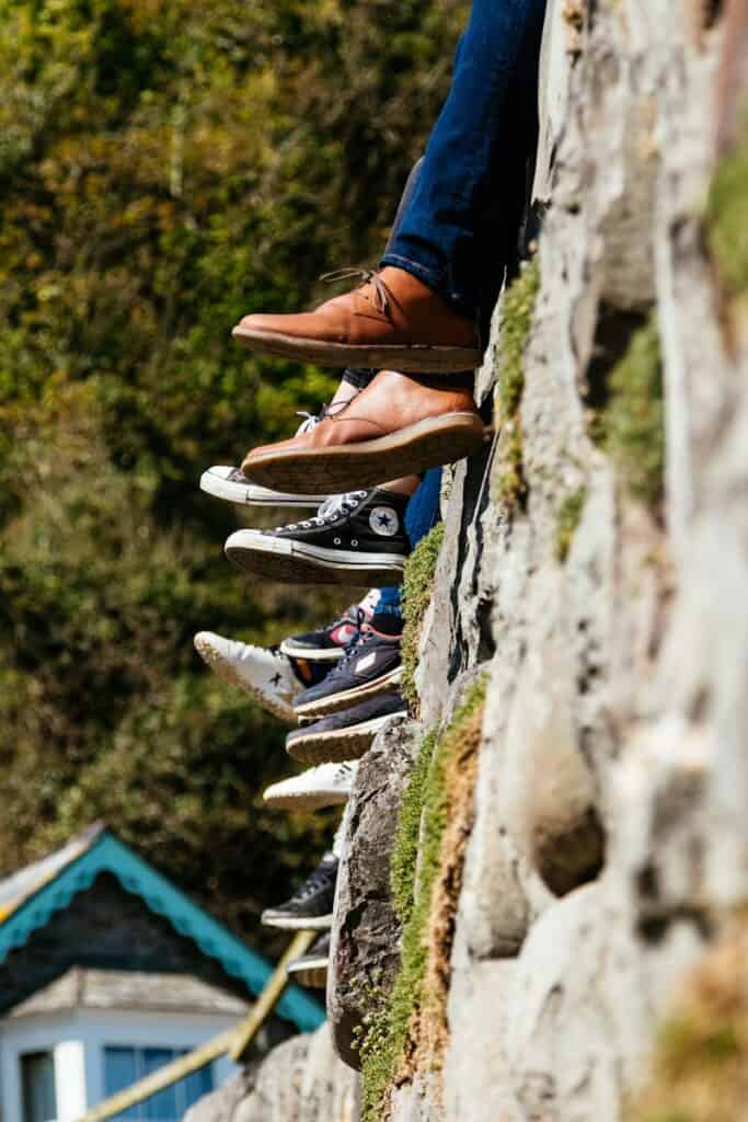 tilt-shift photography of shoes representing a community