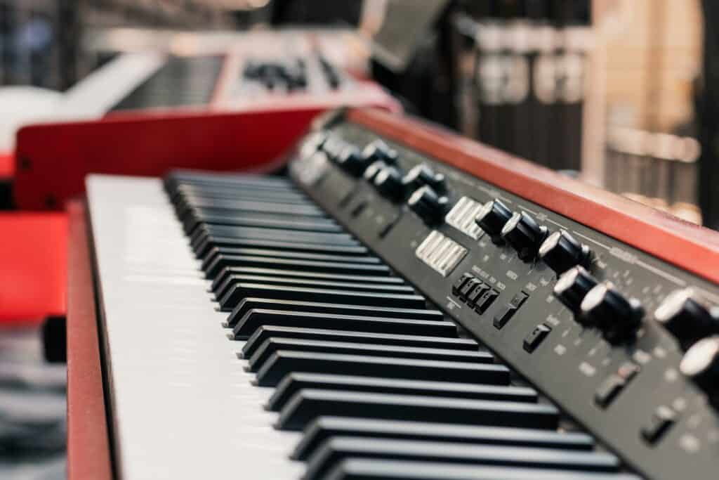 red electric digital piano keyboard