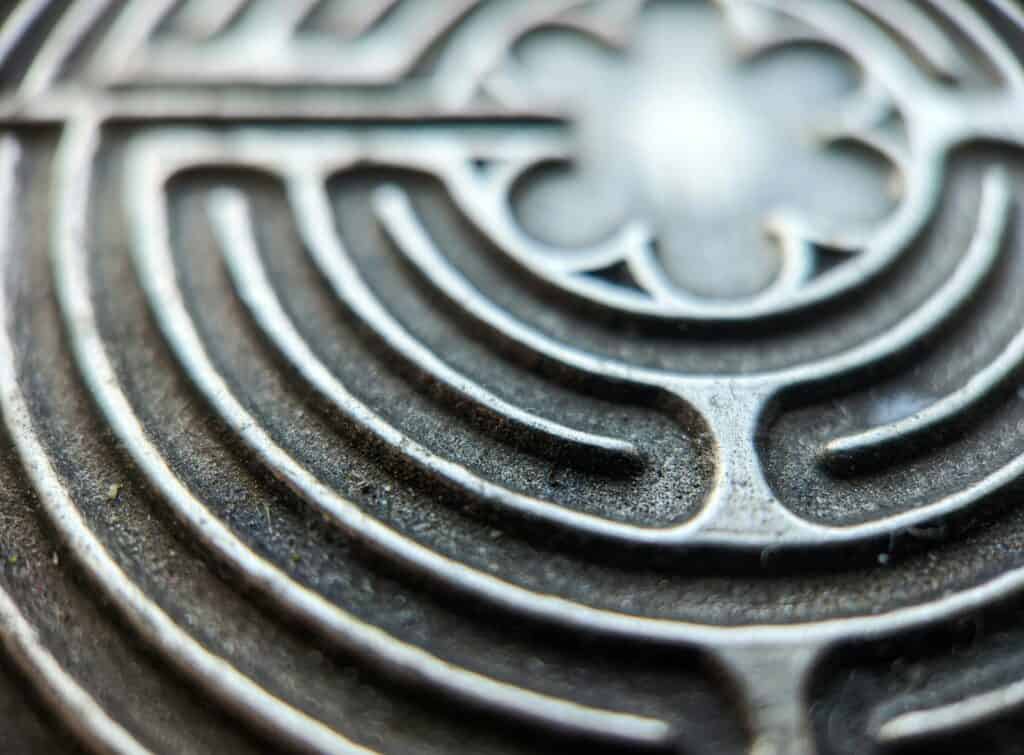 a close up of a metal object that looks like a maze represents the strategic Insights from The Legend of Zelda Series.