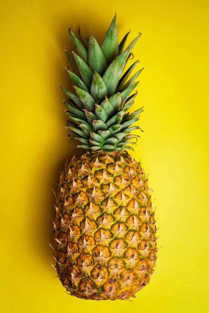 Pineapple on a yellow background .